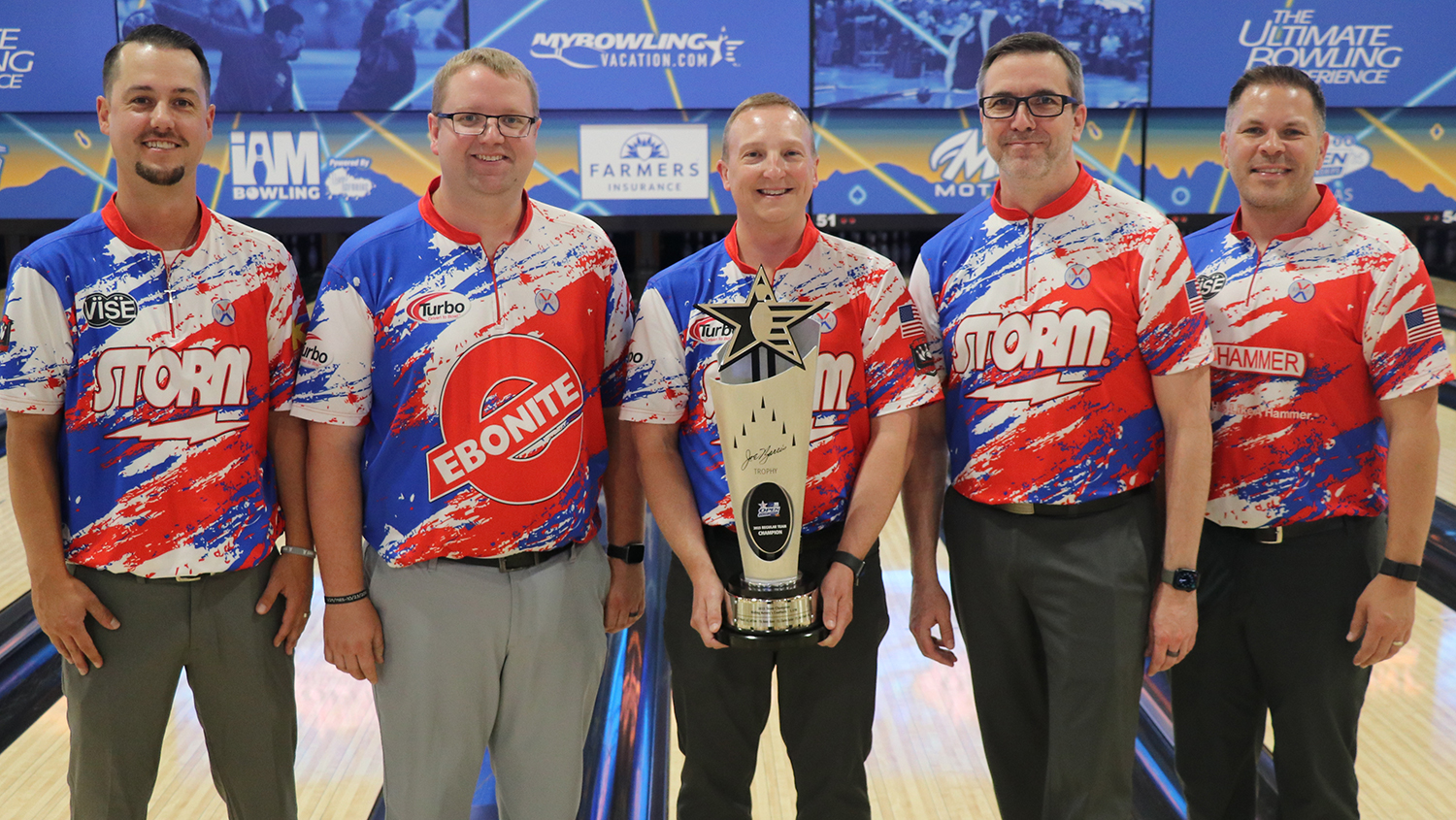 The members of Riding Kenny's Coattails holding the Joe Norris trophy at the 2024 USBC Open Championships